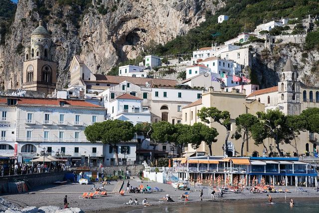 Amalfi town from the sea, the harbour and cathedral steps in the evening light