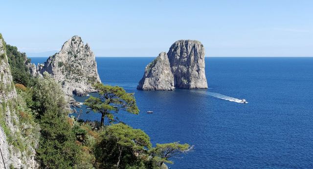 The Faraglioni rocks off Capri seen from the Punta Tragara path