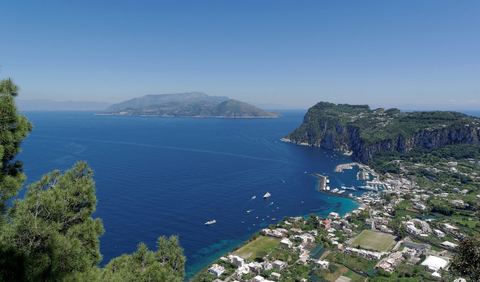 Marina Grande, where every boat lands: the funicular to Capri town starts 100 m from the pier