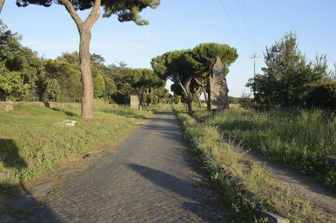 The Appian Way between St Callixtus and St Sebastian: basalt paving, closed to private cars on public holidays, a short walk between the two gates