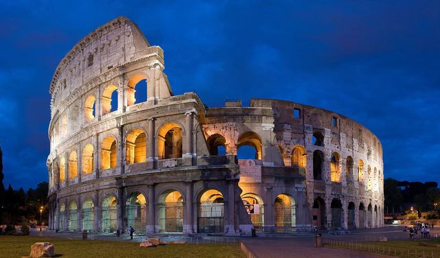 The Colosseum lit at night, the setting for the sunset and evening tours on this page