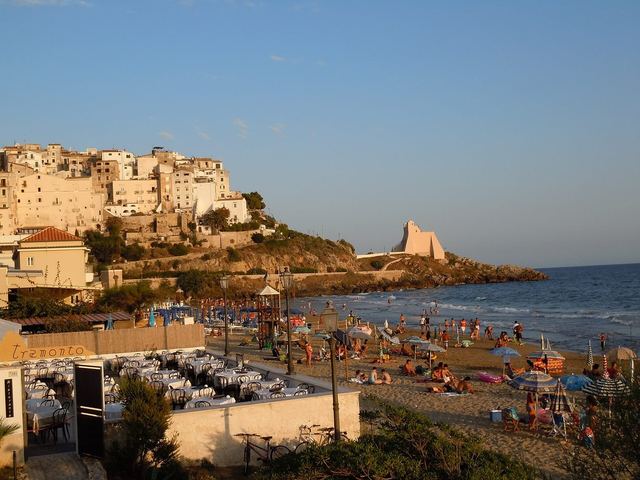 Sperlonga's white old town above the sandy beach